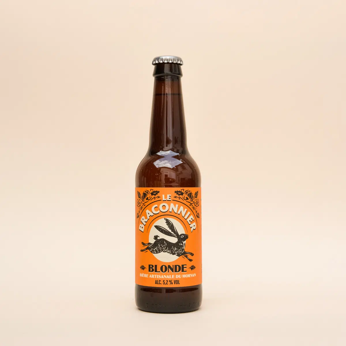 Petite bouteille de bière blonde de la brasserie Le Braconnier